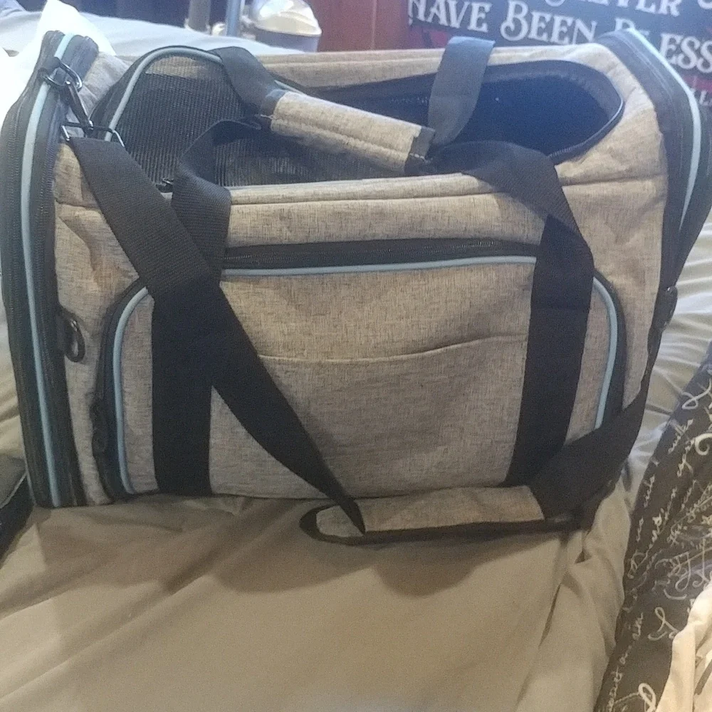A small dog carrier excellent condition never used